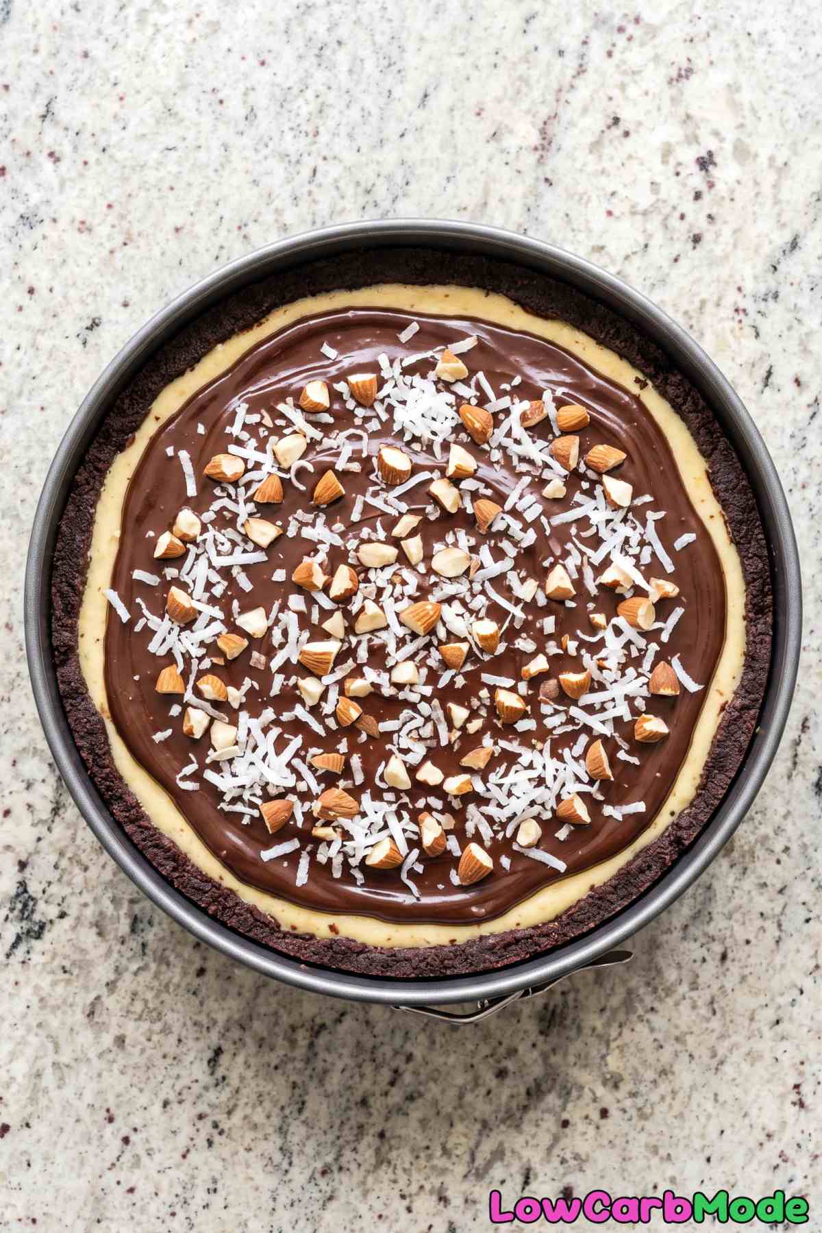 Keto Almond Joy cheesecake slice on plate