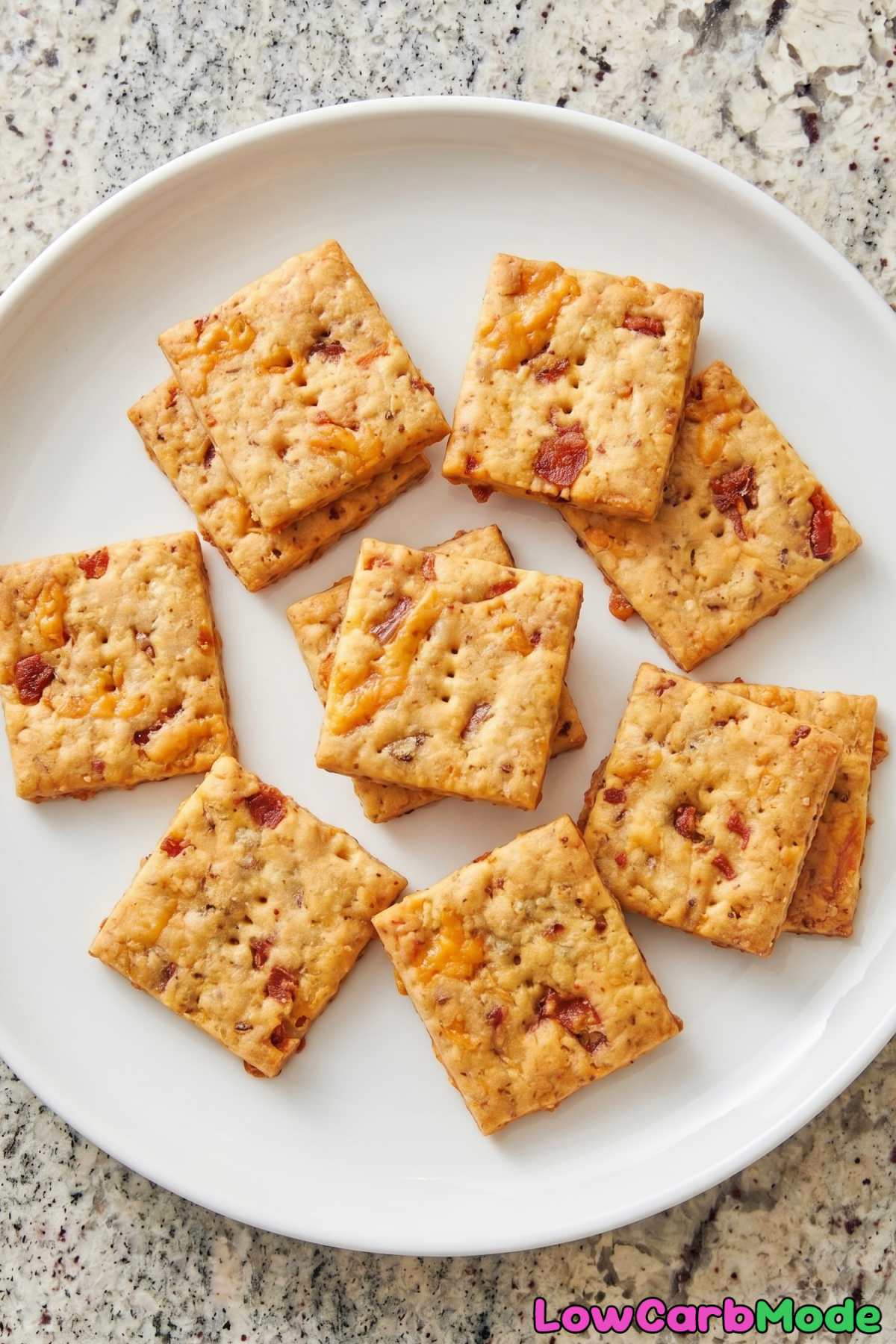 Easy keto bacon cheddar crackers on a board