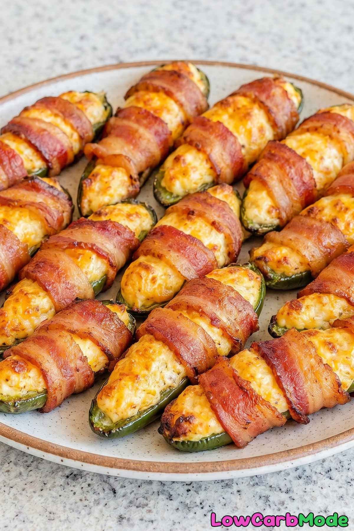 Cheesy keto bacon wrapped jalapeño poppers