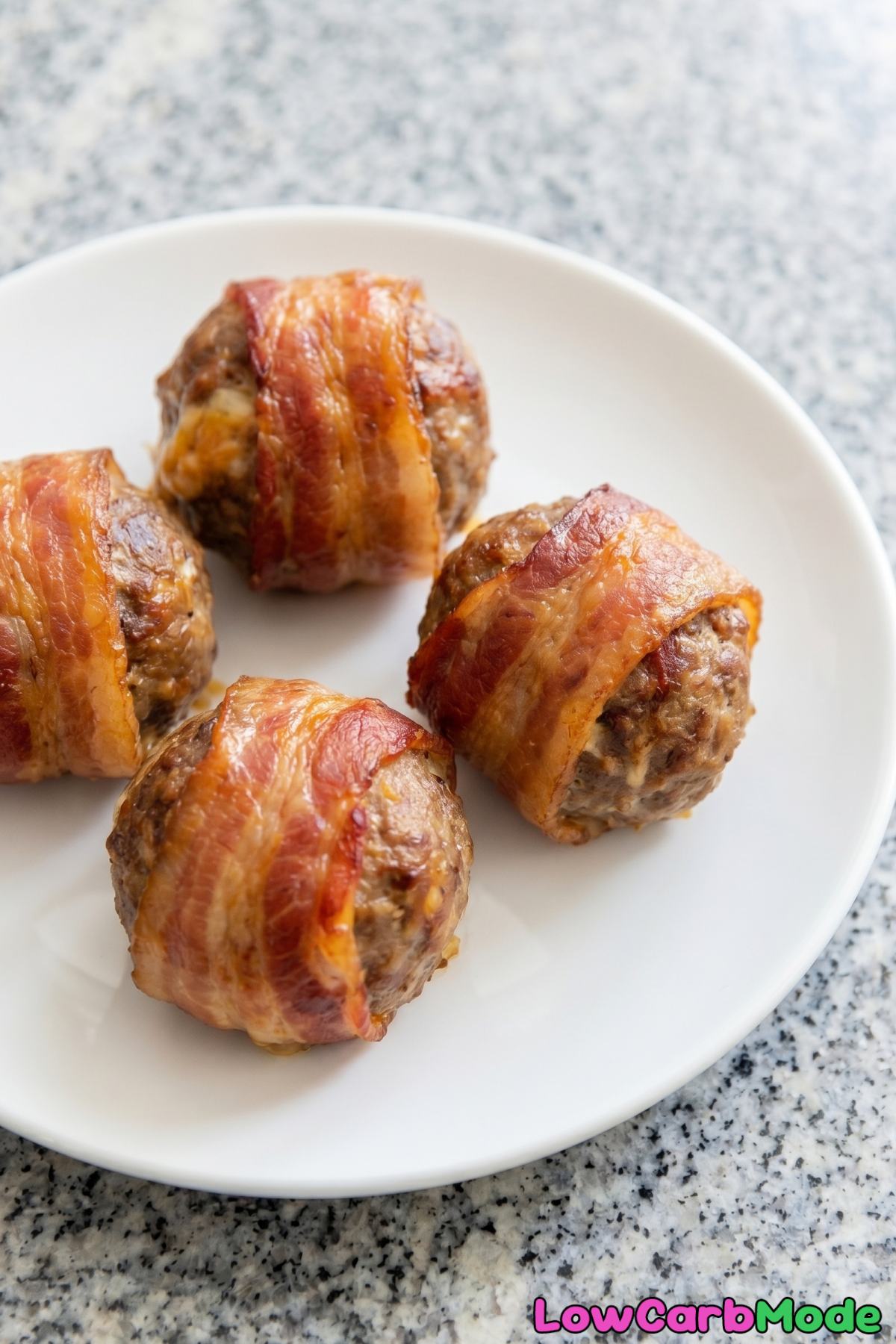 irresistible bacon wrapped stuffed meatballs