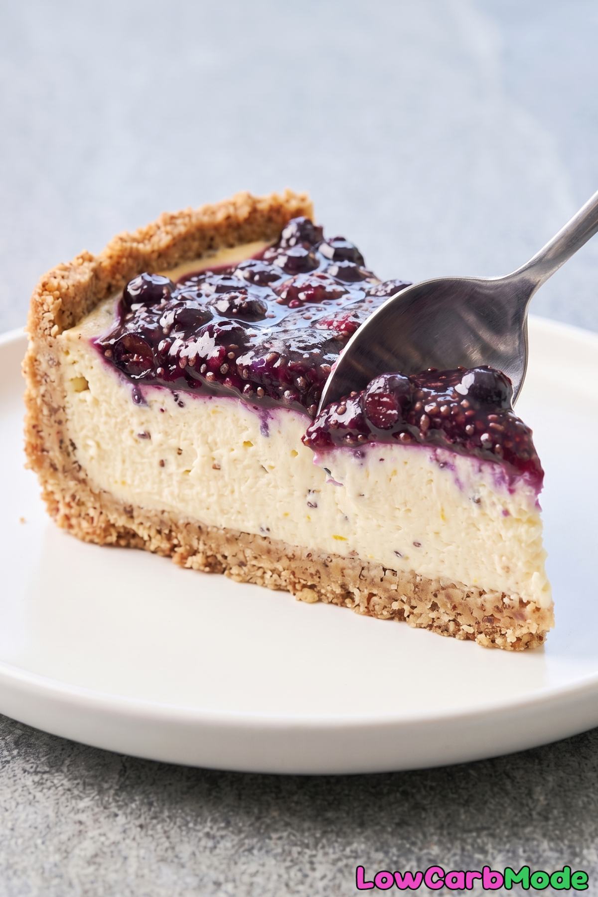 Keto blueberry lavender cheesecake slice