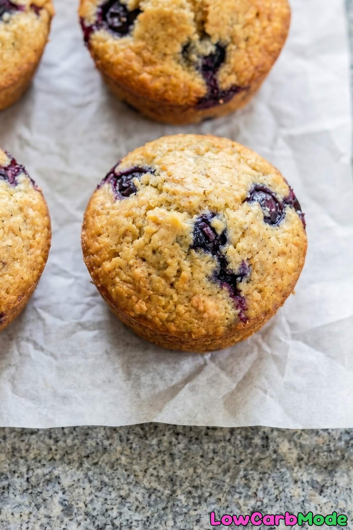 Golden keto blueberry muffins close up