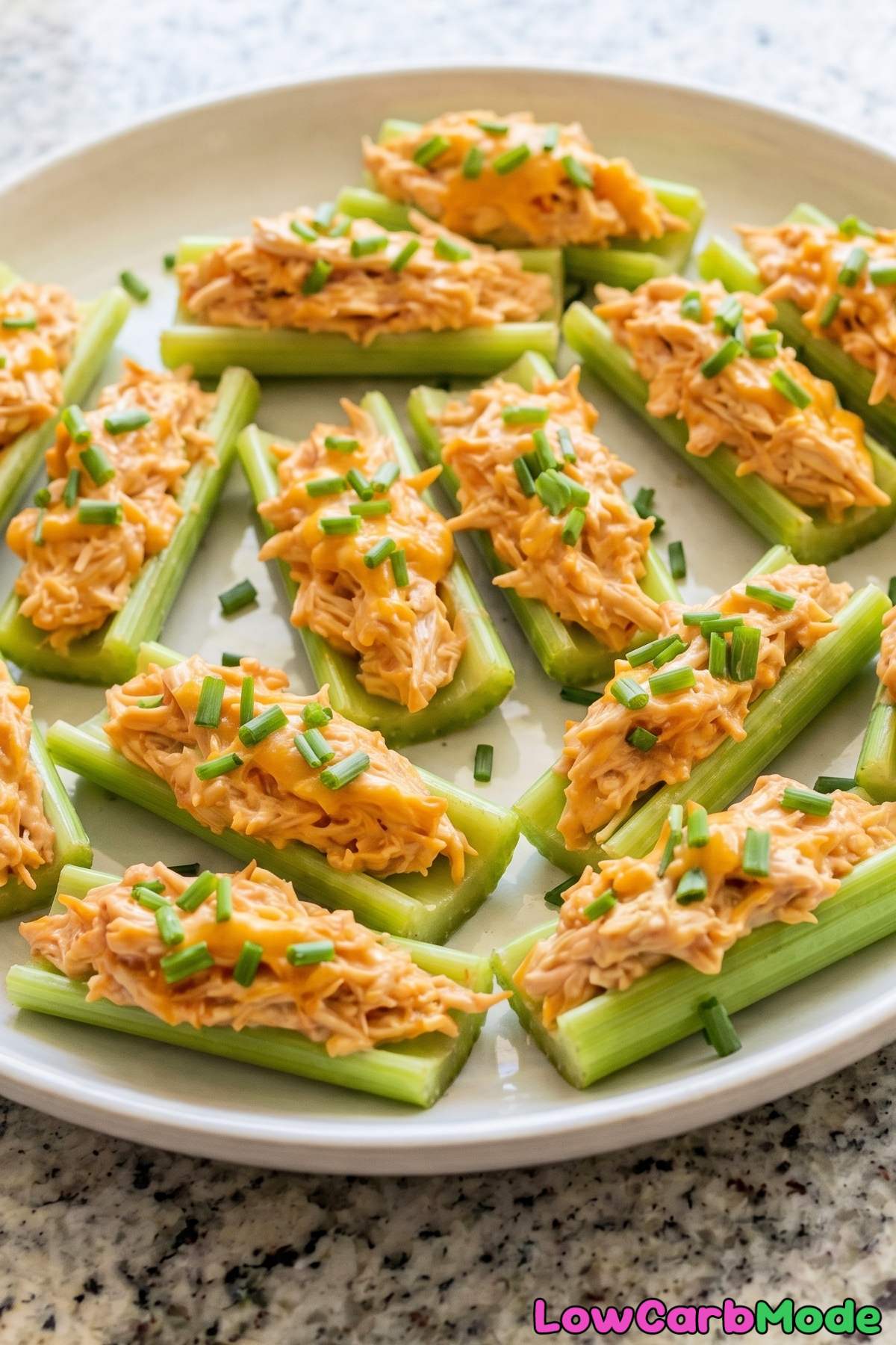 Tangy keto buffalo chicken celery bites