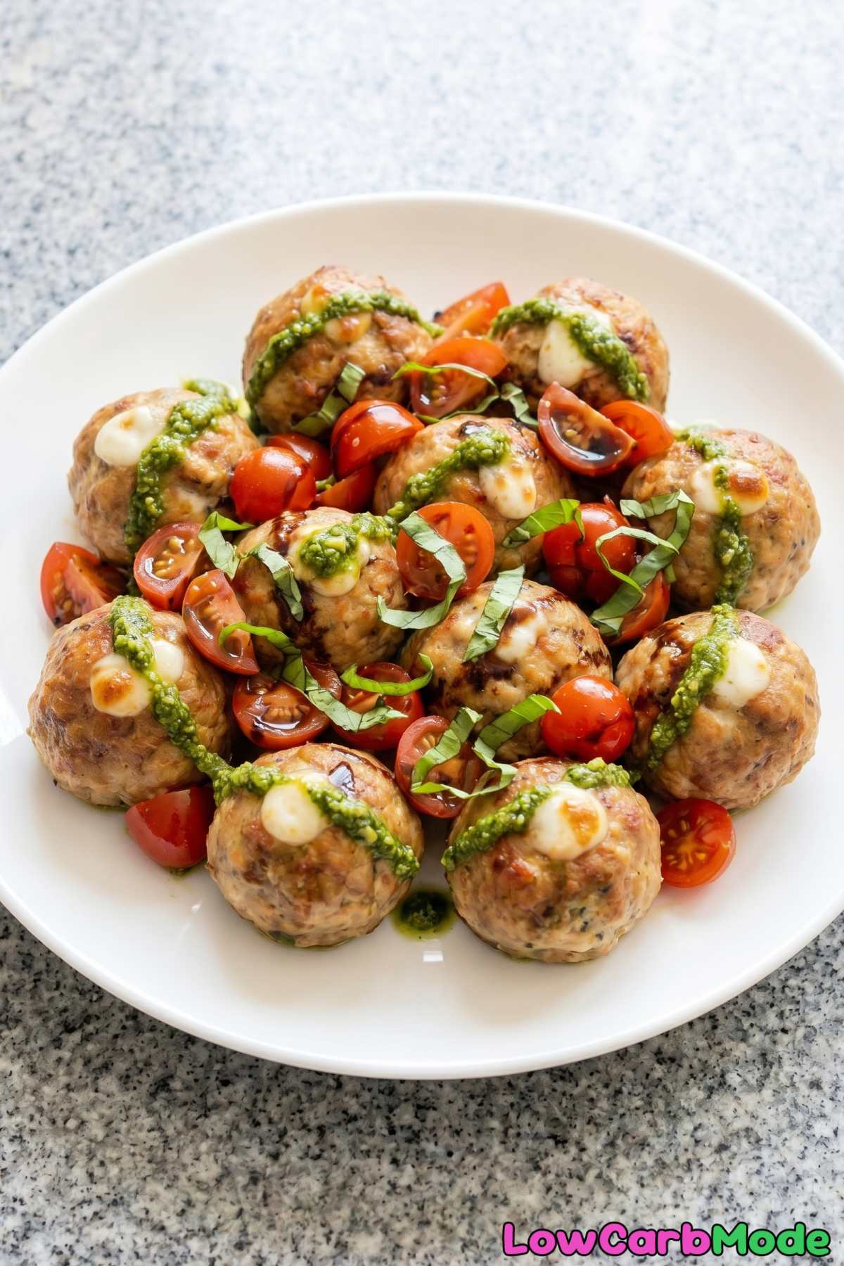 irresistible keto caprese meatballs sliced open