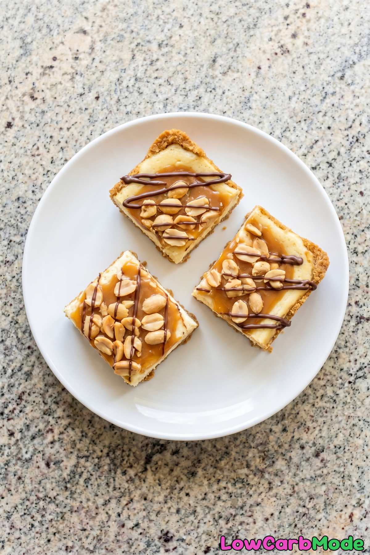 Indulgent keto caramel peanut cheesecake bars