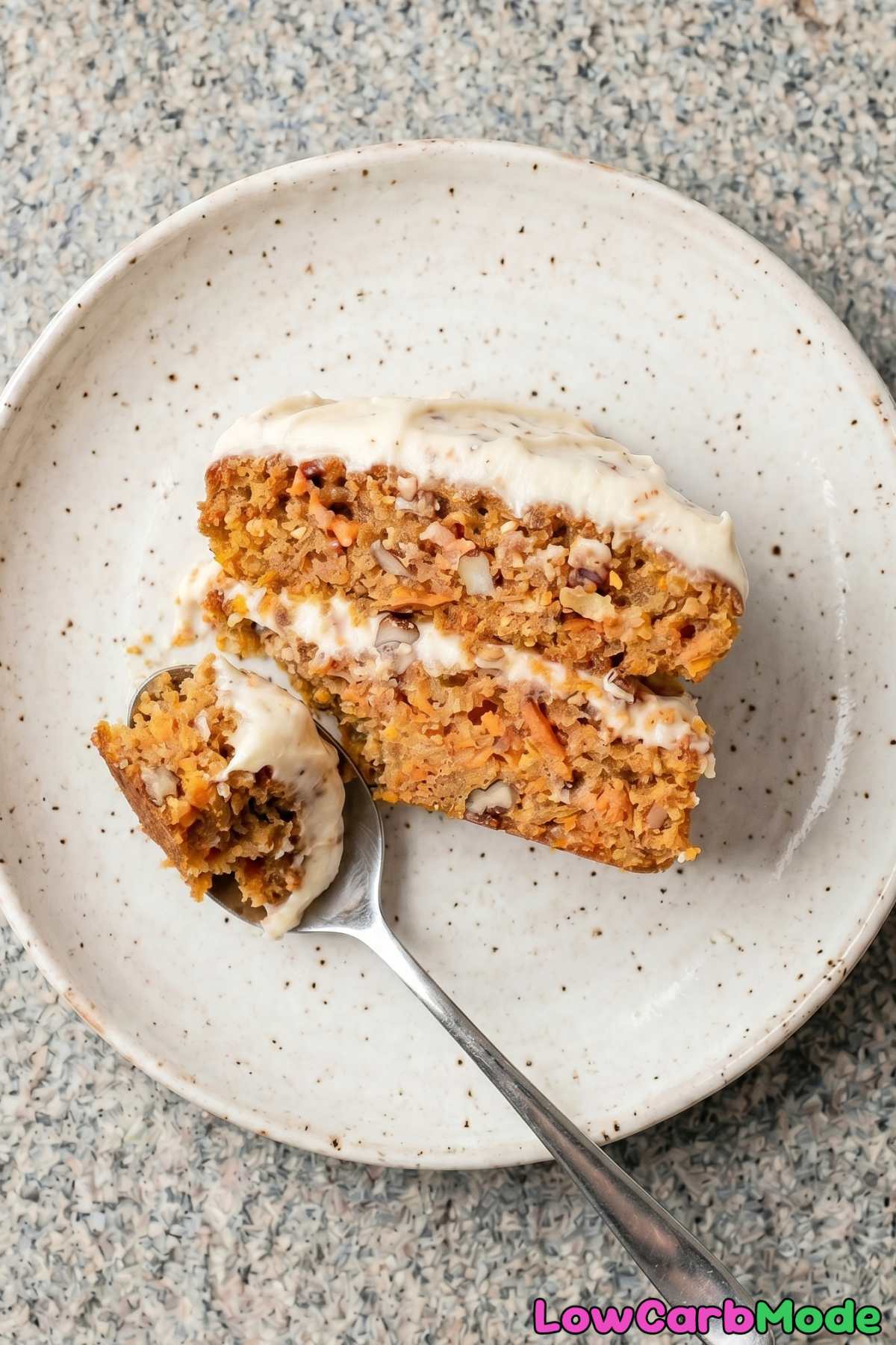 Tender keto carrot cake on a white plate
