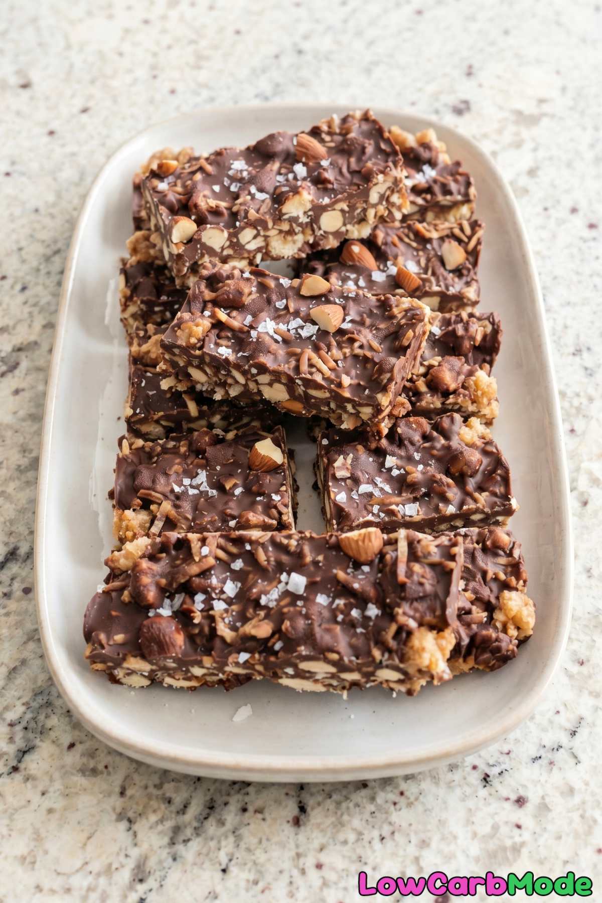 Rich keto chocolate crunch bars stacked