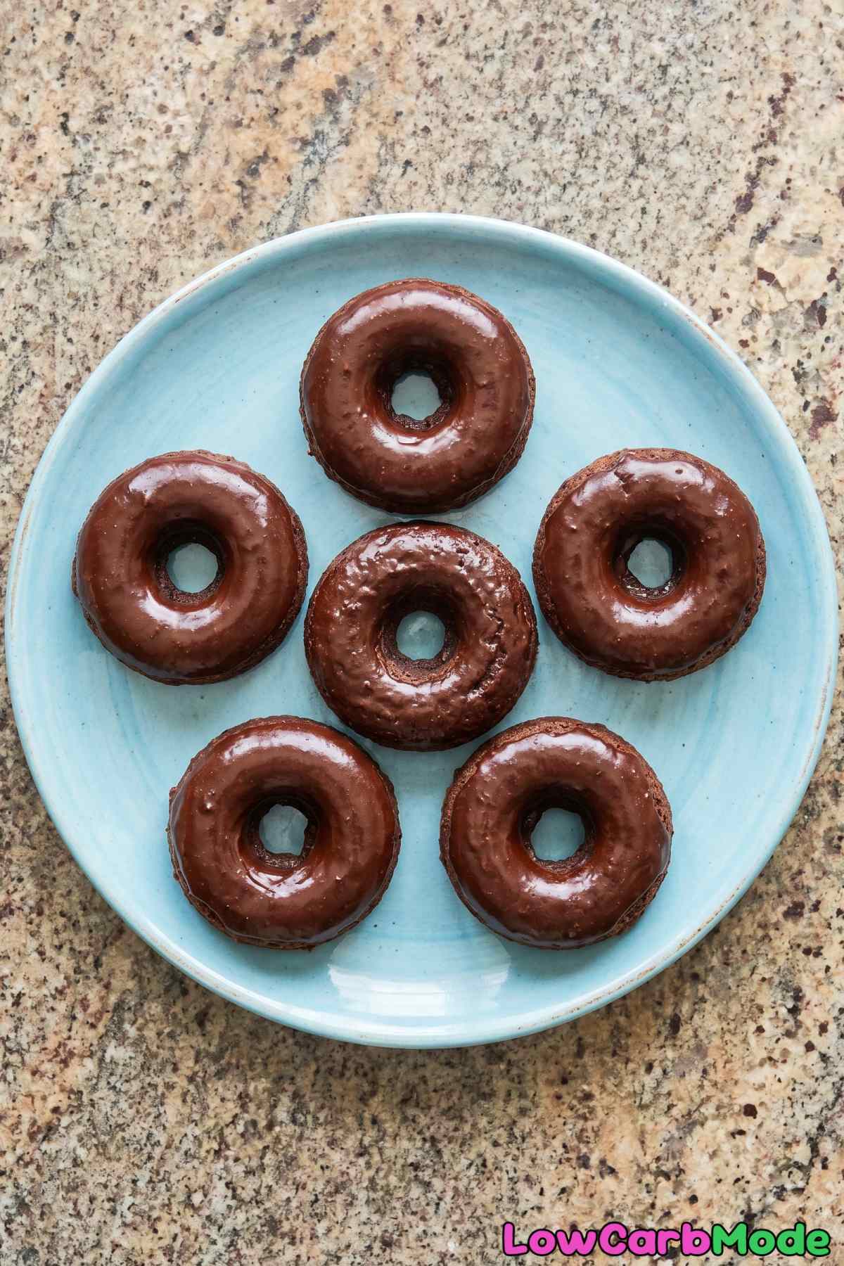 Moist keto chocolate donuts stacked up