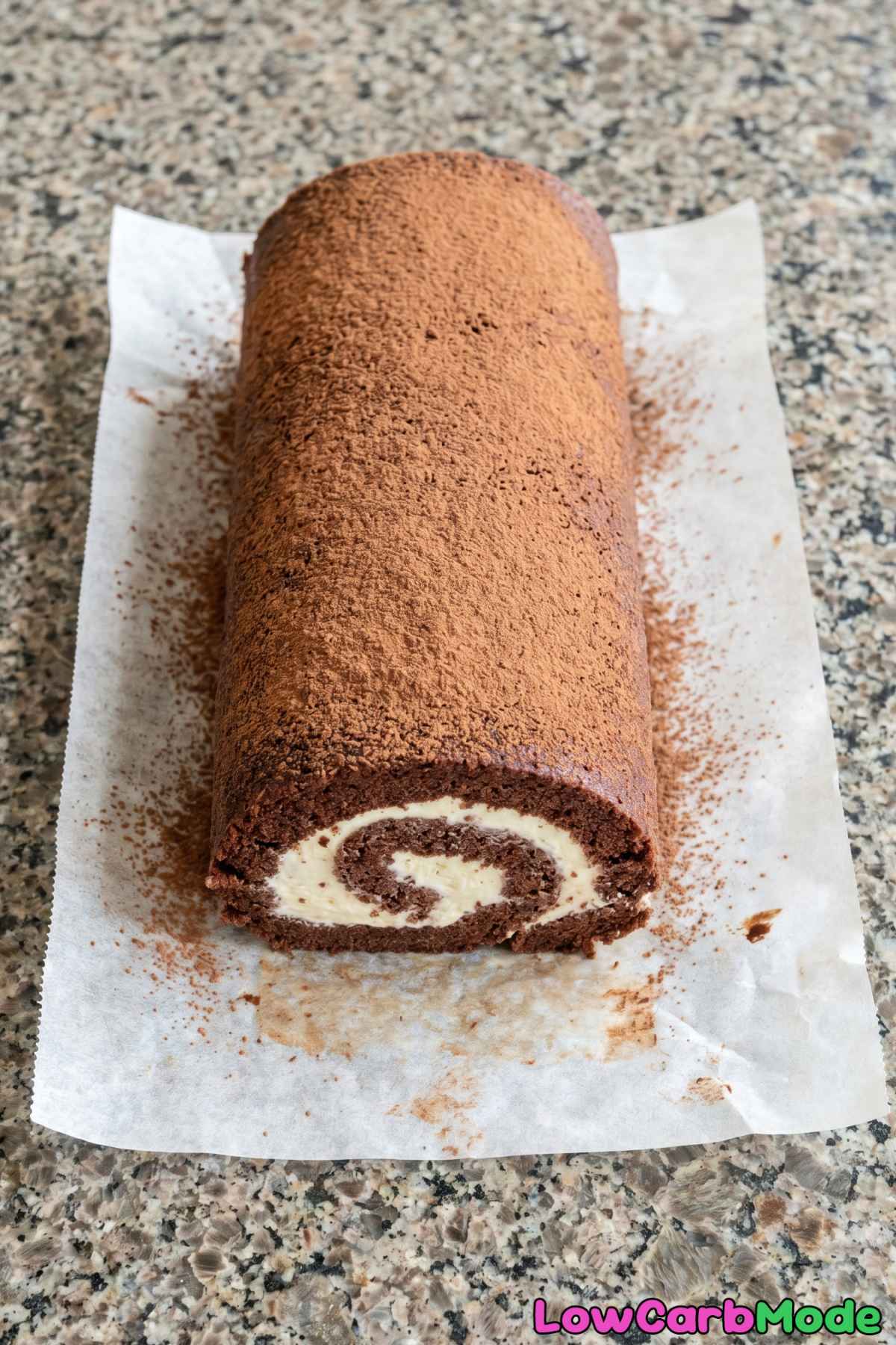 Indulgent keto chocolate swiss roll serving