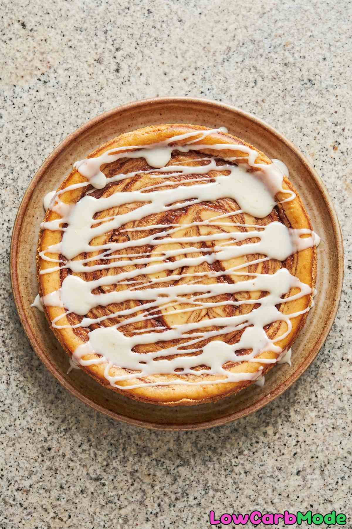 Rich keto cinnamon roll cheesecake slice