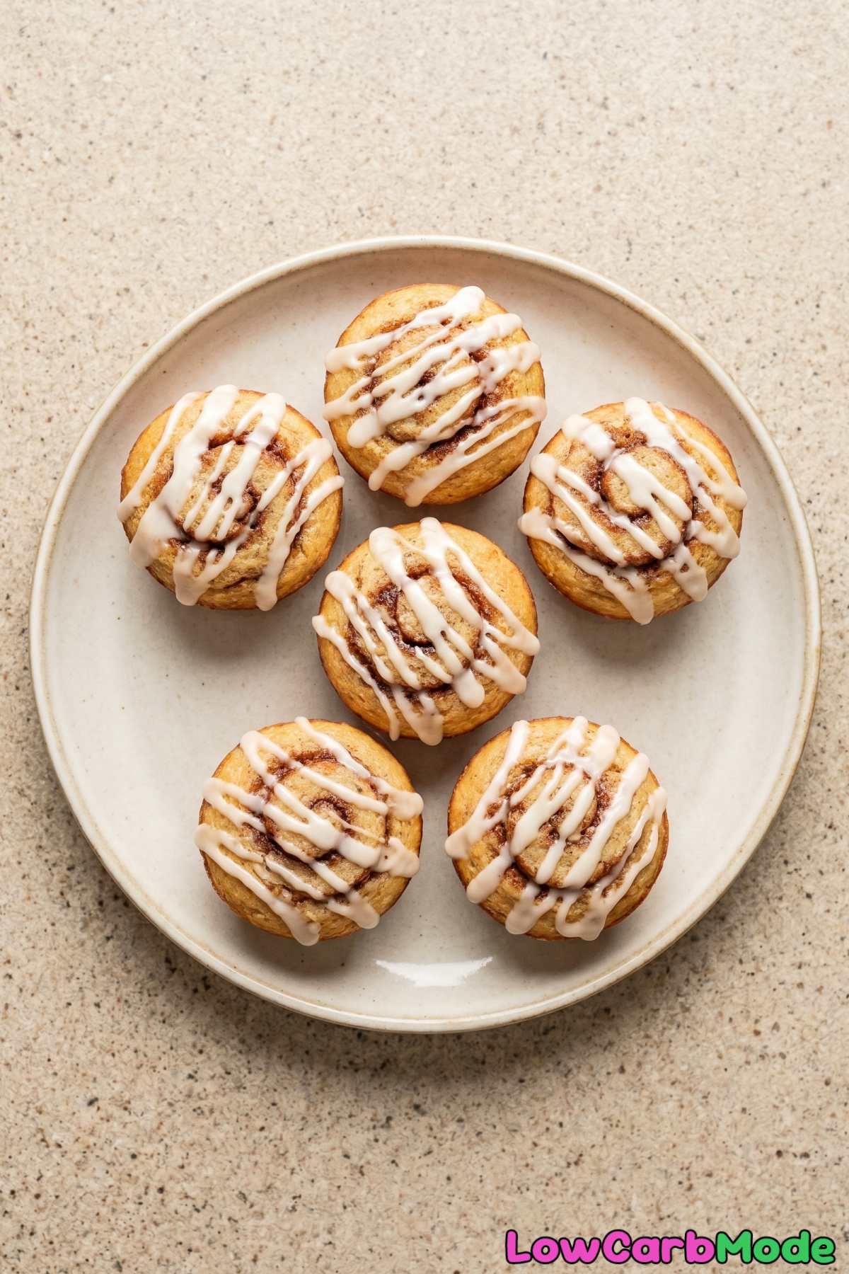 Fluffy keto cinnamon roll muffins on plate