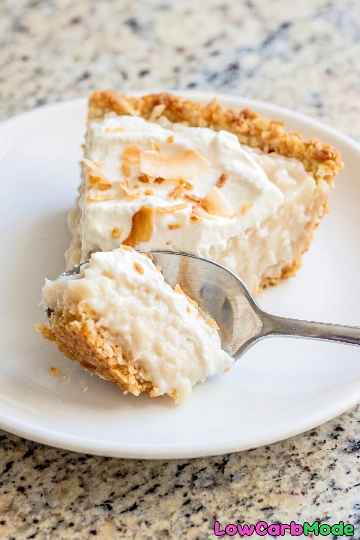Rich keto coconut cream pie with topping