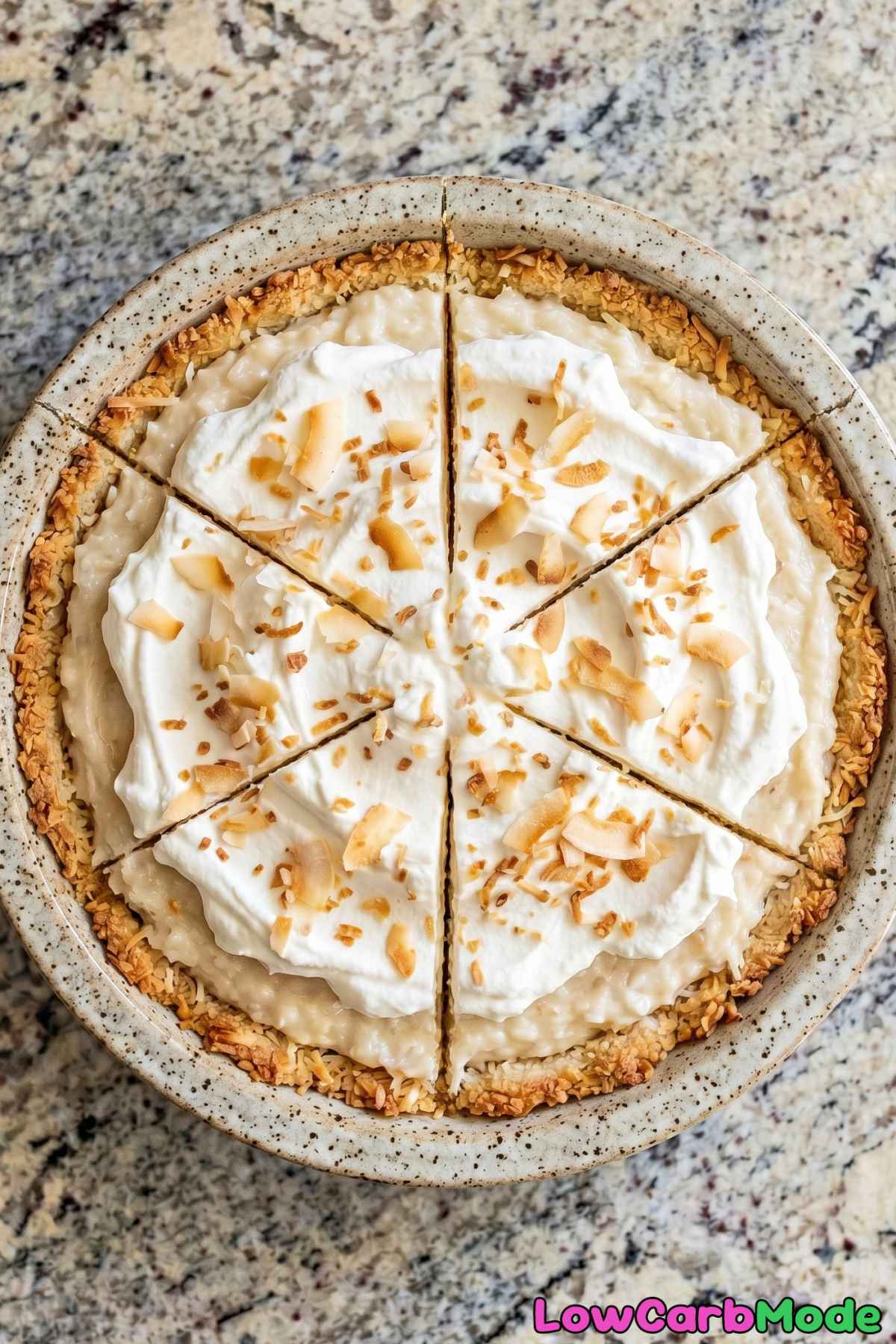 Silky keto coconut cream pie on plate