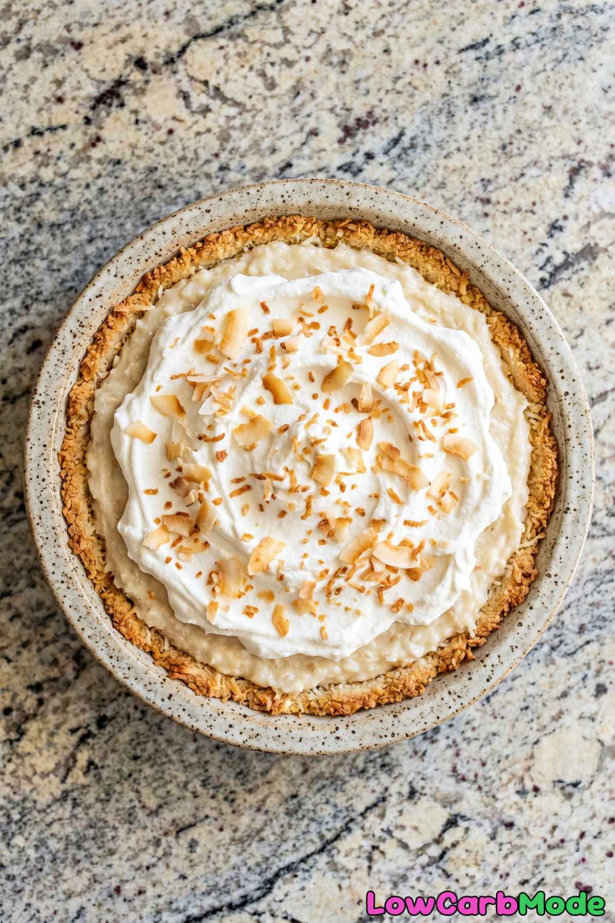 Smooth keto coconut cream pie portion