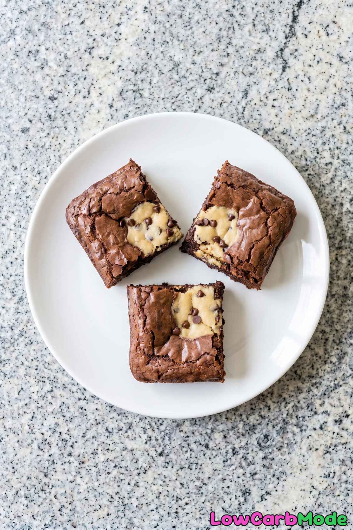 Sliced keto cookie dough stuffed brownies
