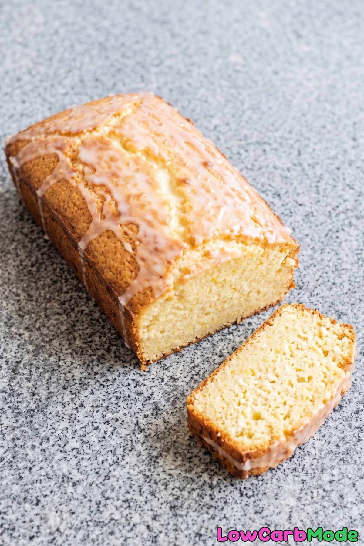 Glazed keto lemon drizzle cake slice