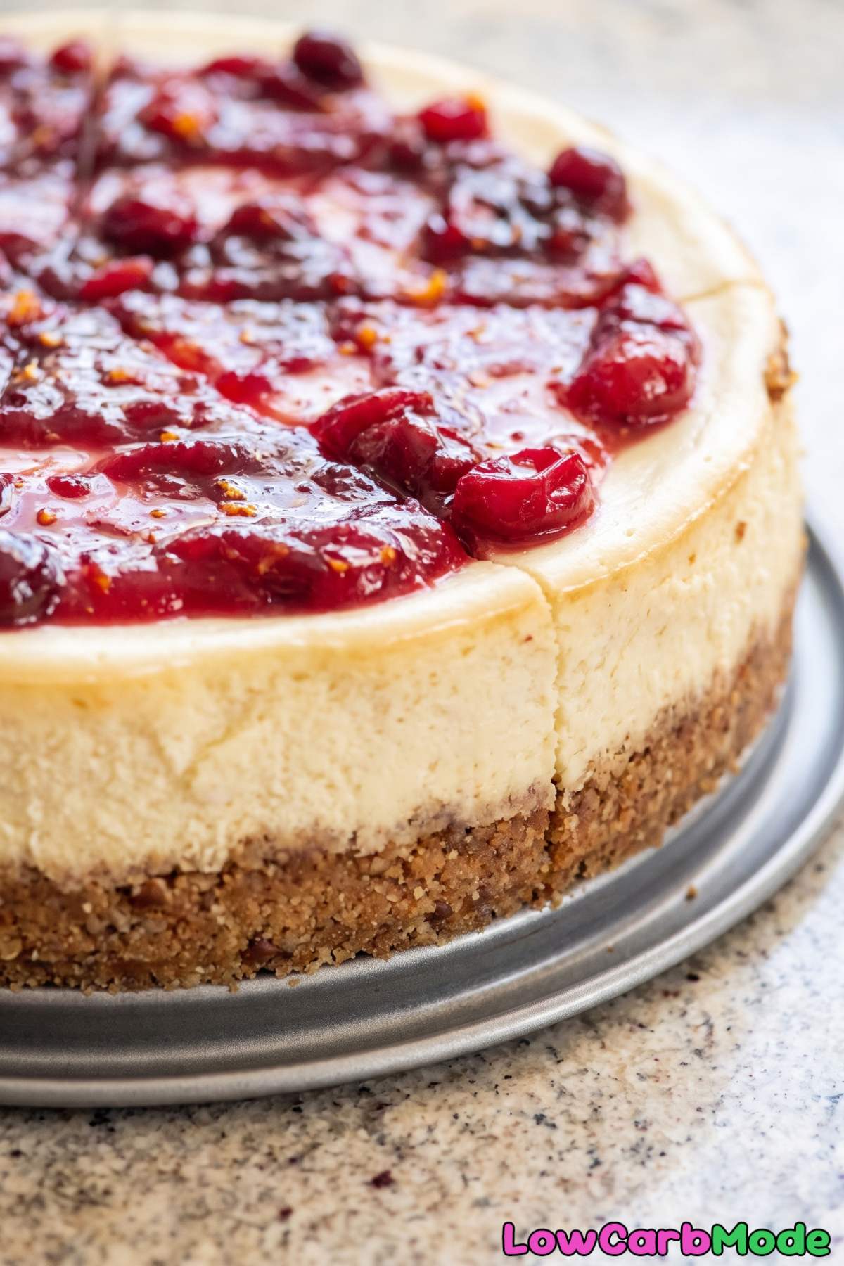 Keto cranberry orange cheesecake slice