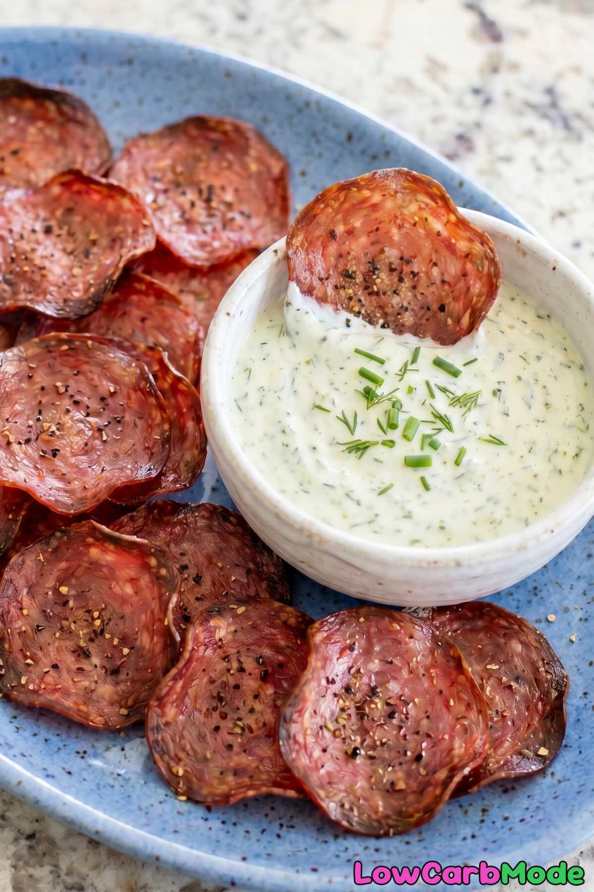 Wholesome keto salami chips with herb dip