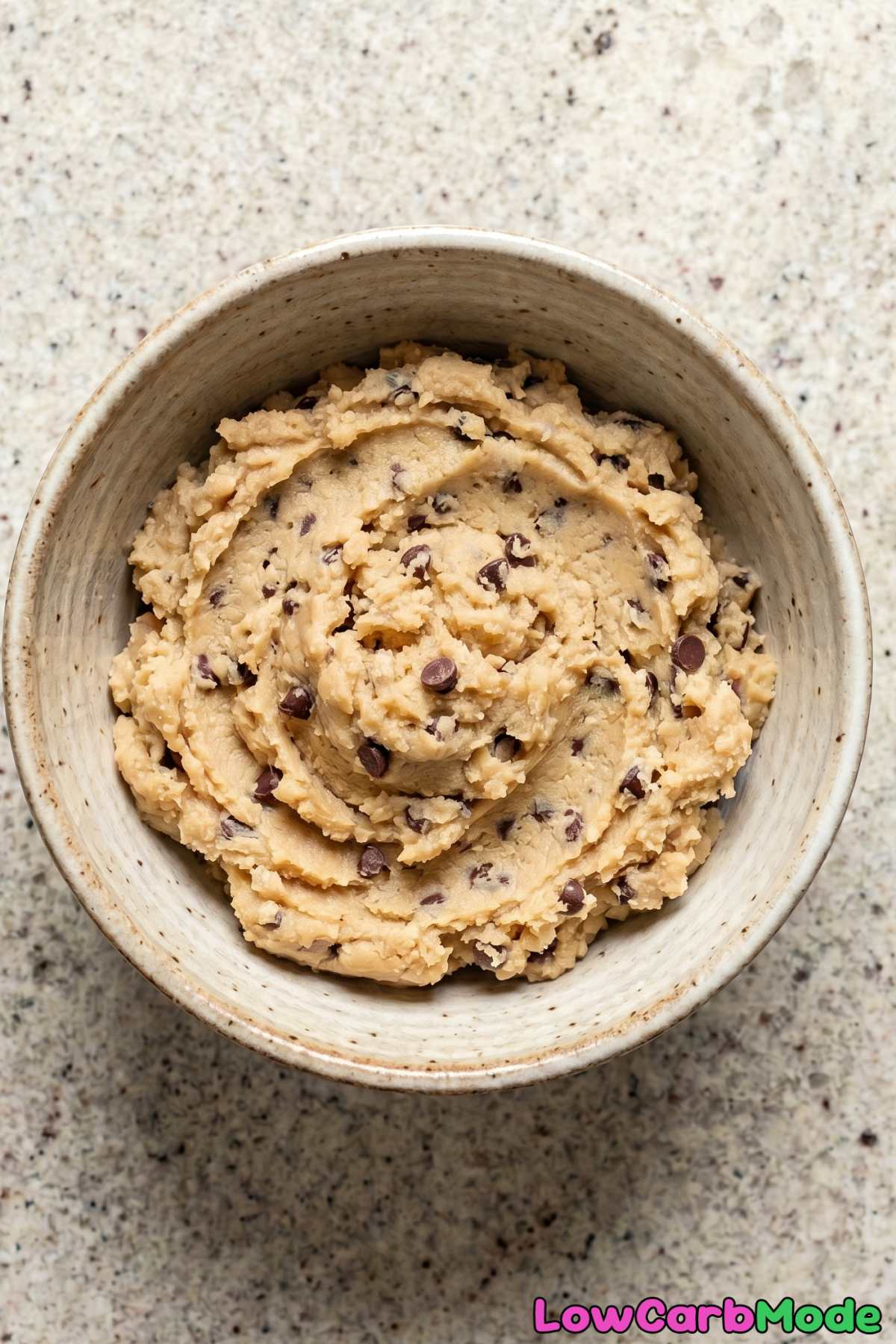 Luscious keto edible cookie dough with a spoon