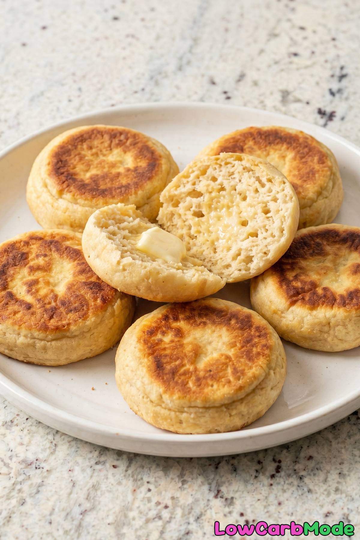 fluffy keto English muffins on a plate