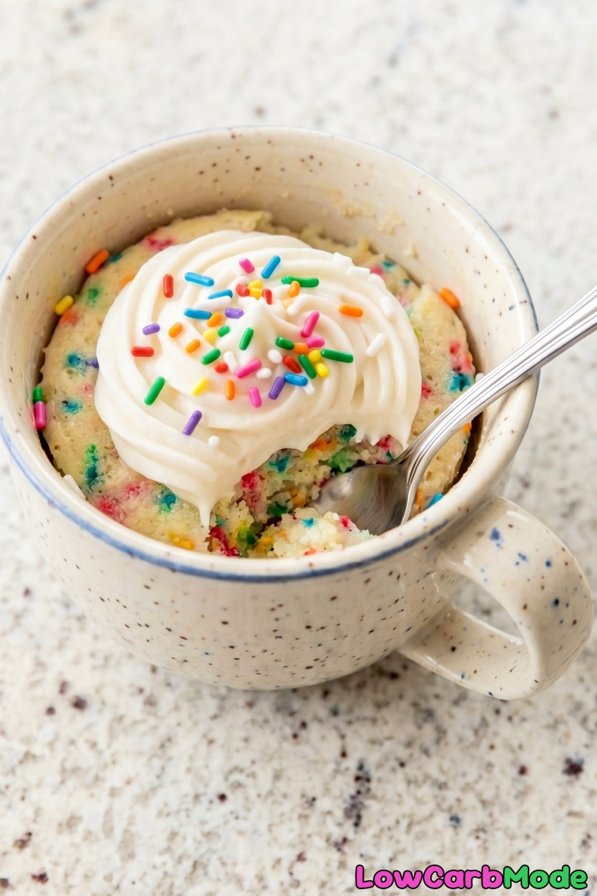 Sprinkle-topped keto funfetti mug cake