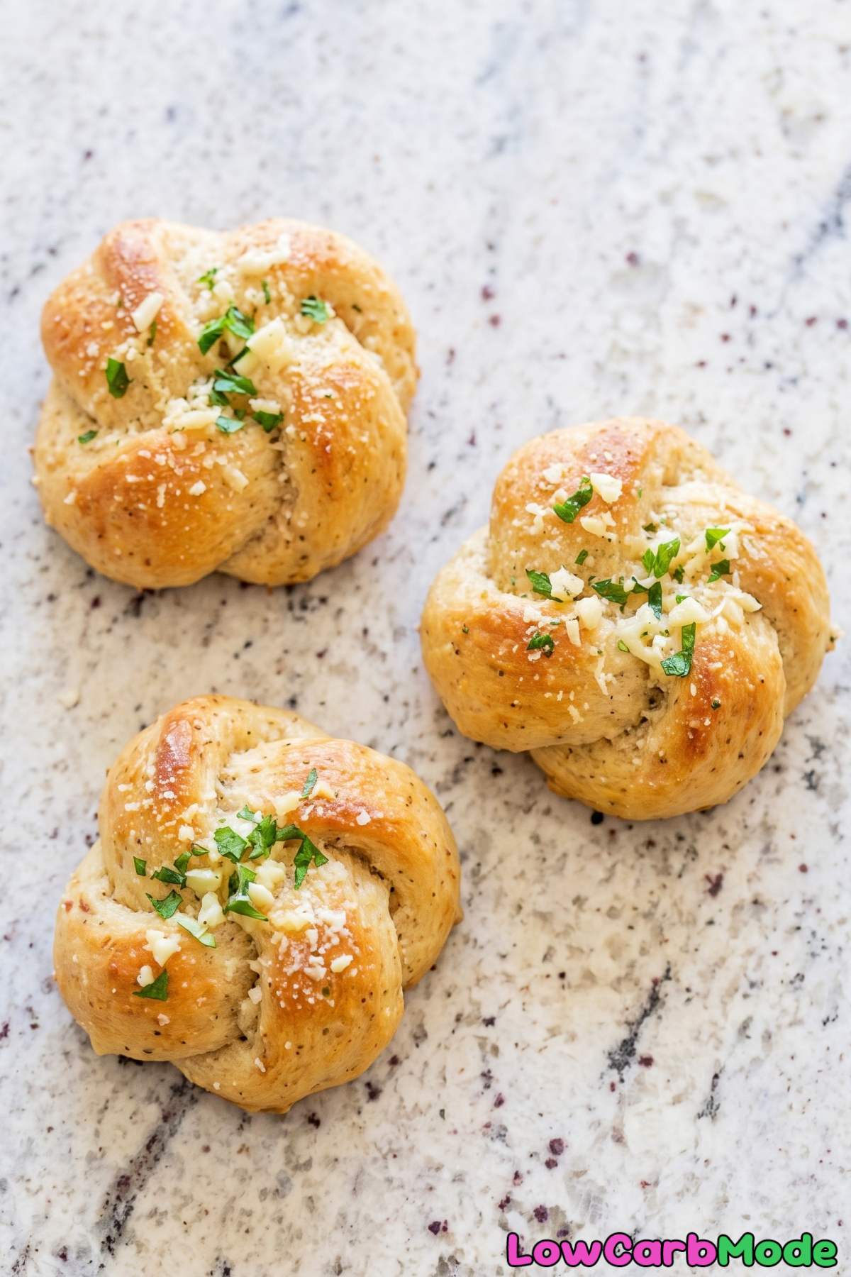 Warm keto garlic knots with parsley