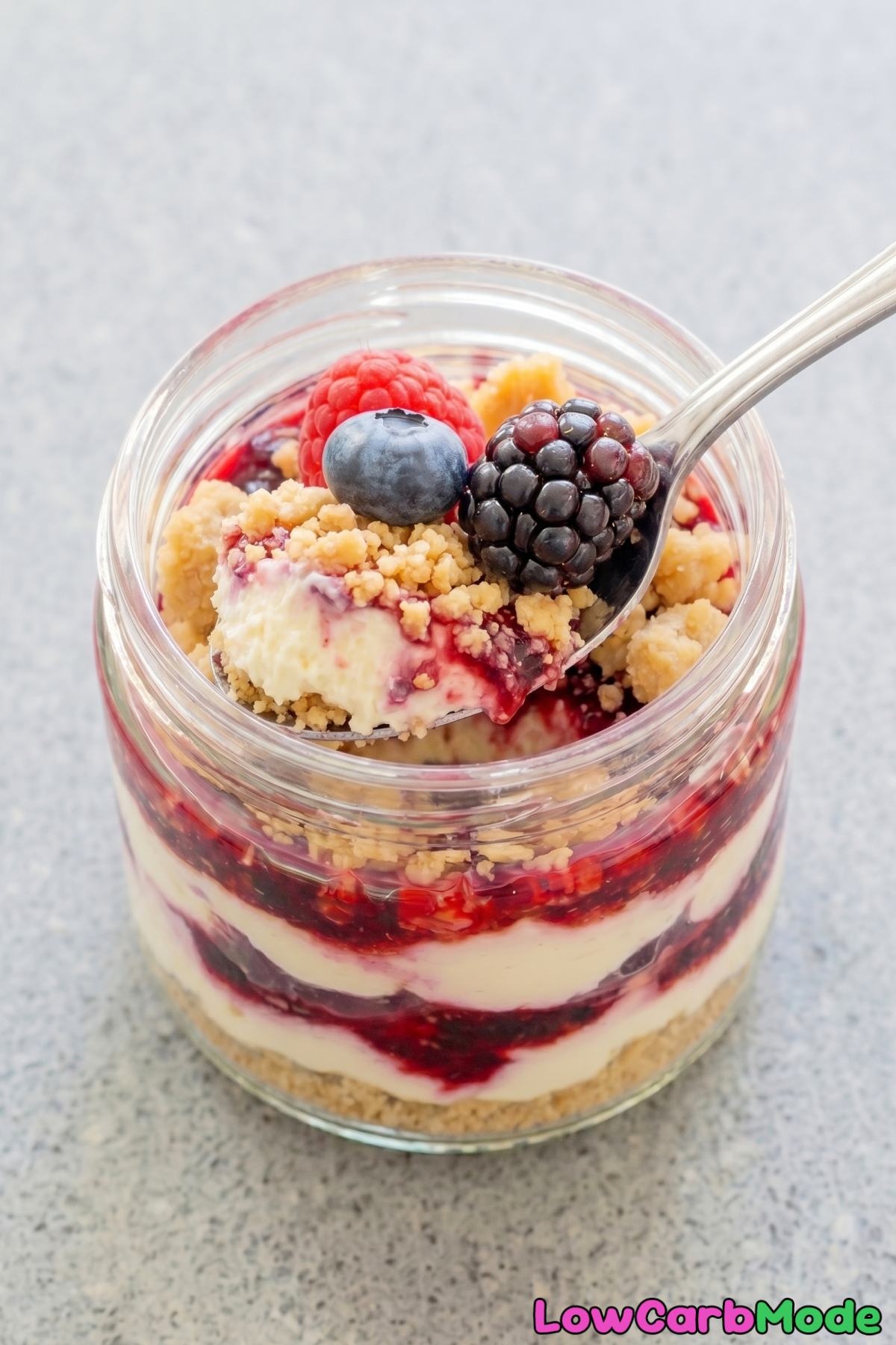 Decadent keto layered berry cheesecake jars
