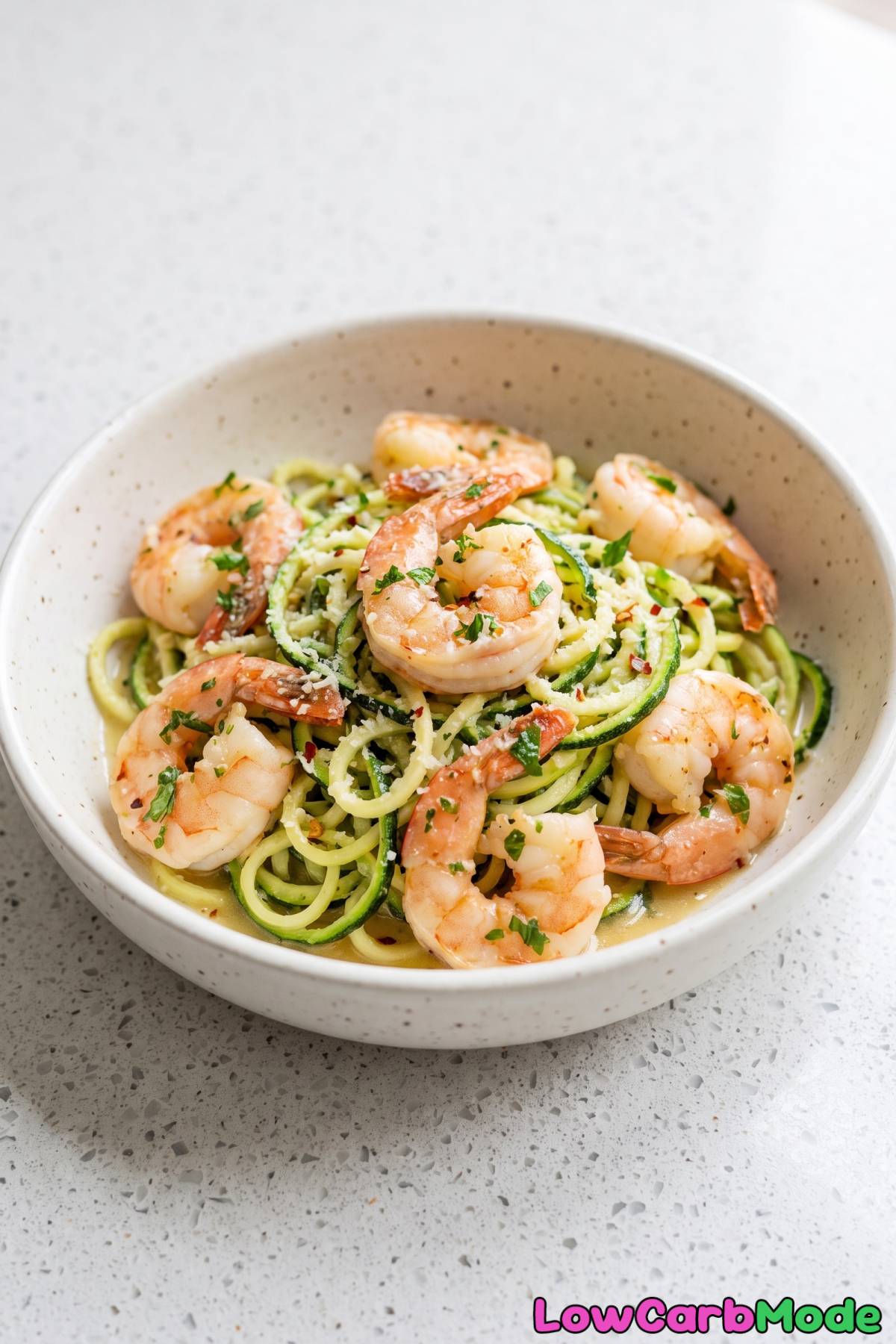 Tender garlic butter shrimp on zoodles