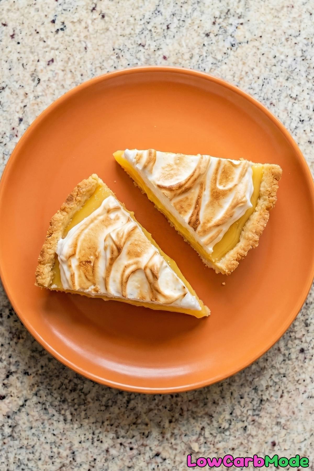 Tangy keto lemon meringue pie on plate
