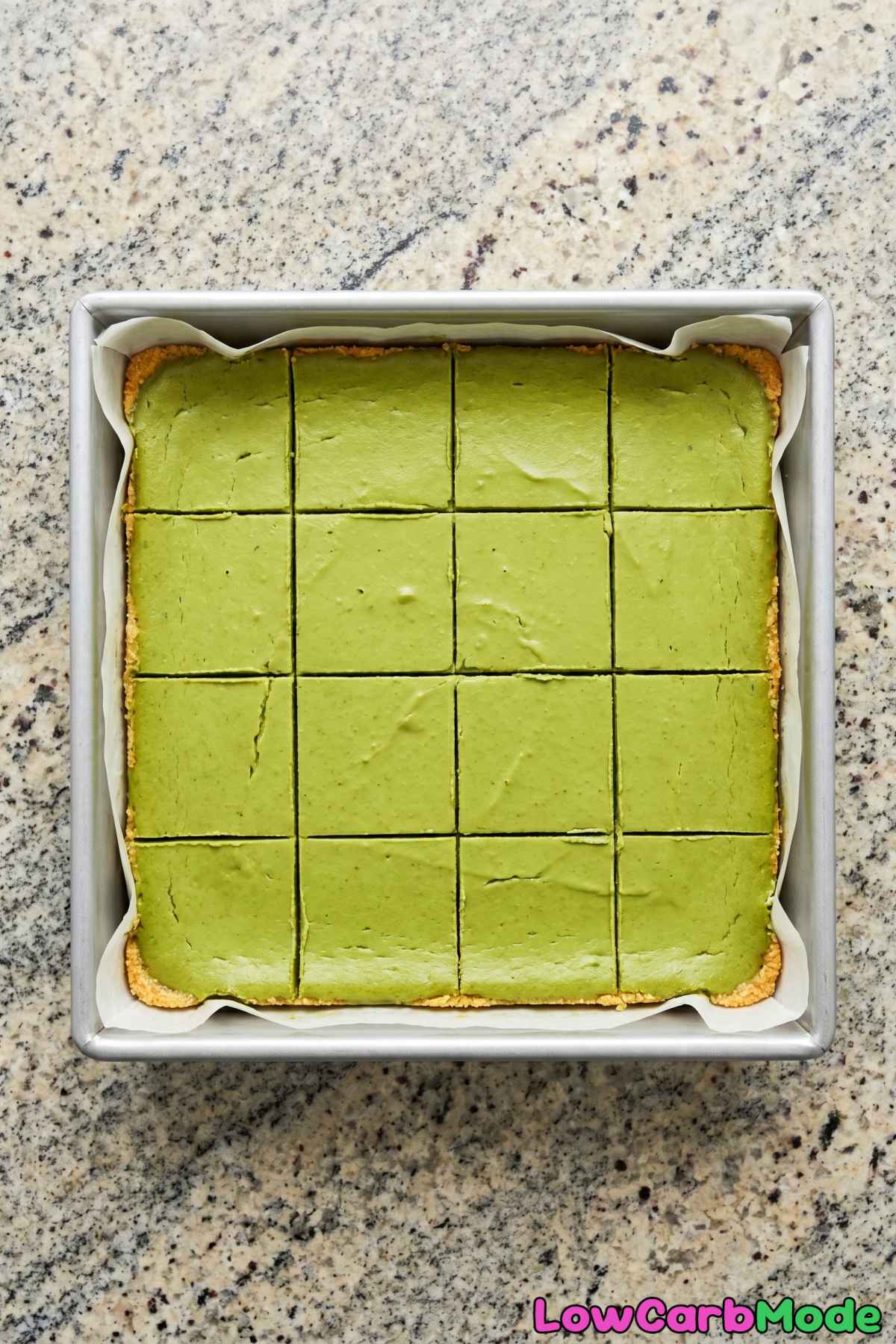 Smooth keto matcha cheesecake bars plated