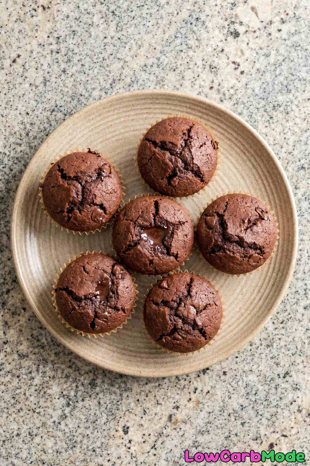 Tender keto chocolate lava muffin halved