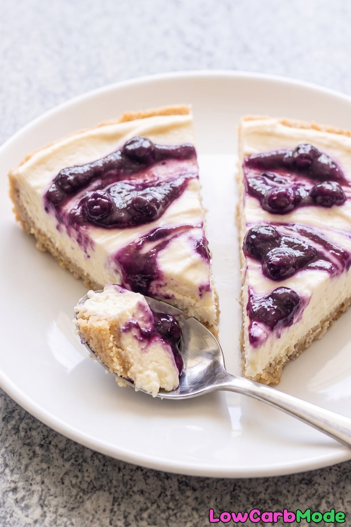 Sliced keto lemon curd cheesecake