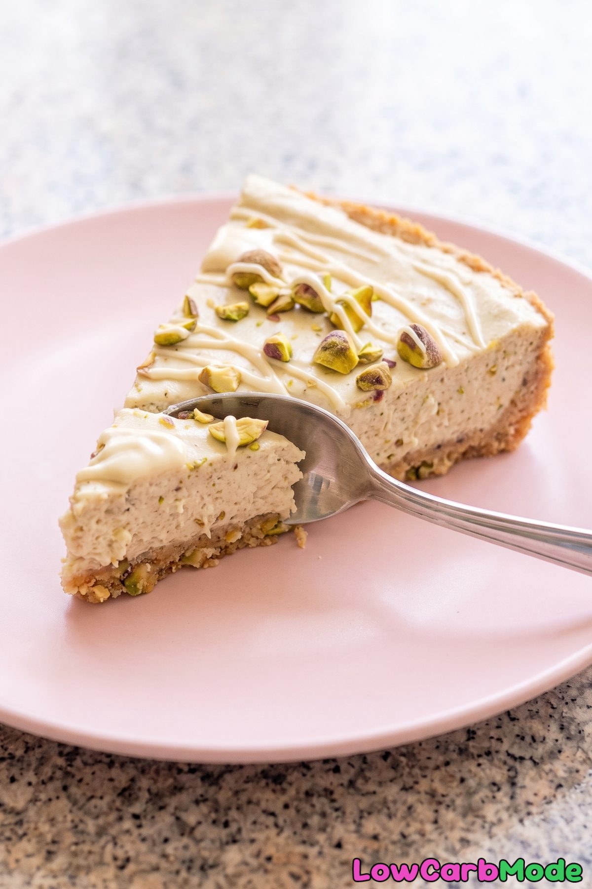 Creamy keto cardamom pistachio cheesecake