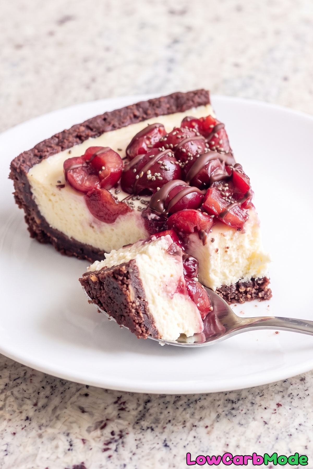Dark chocolate cherry keto cheesecake slice