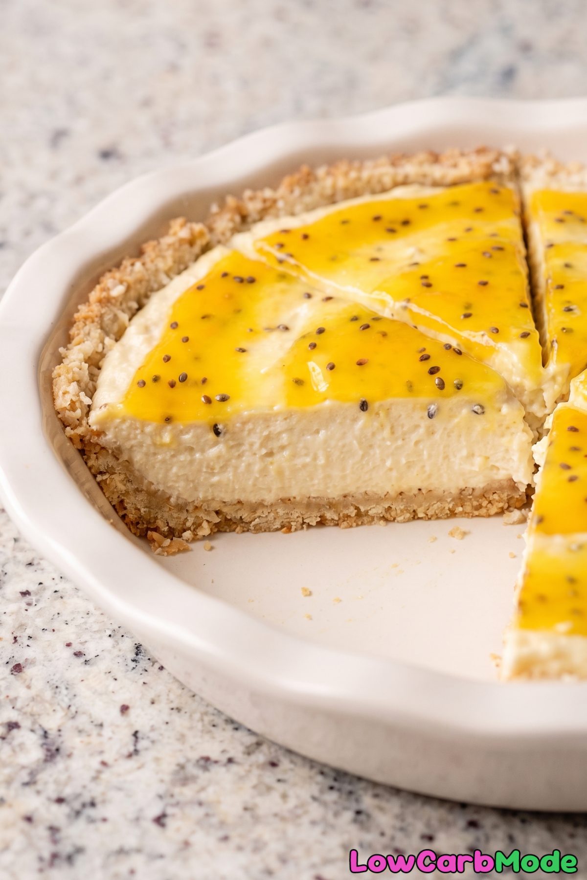 Keto cheesecake with passion fruit topping