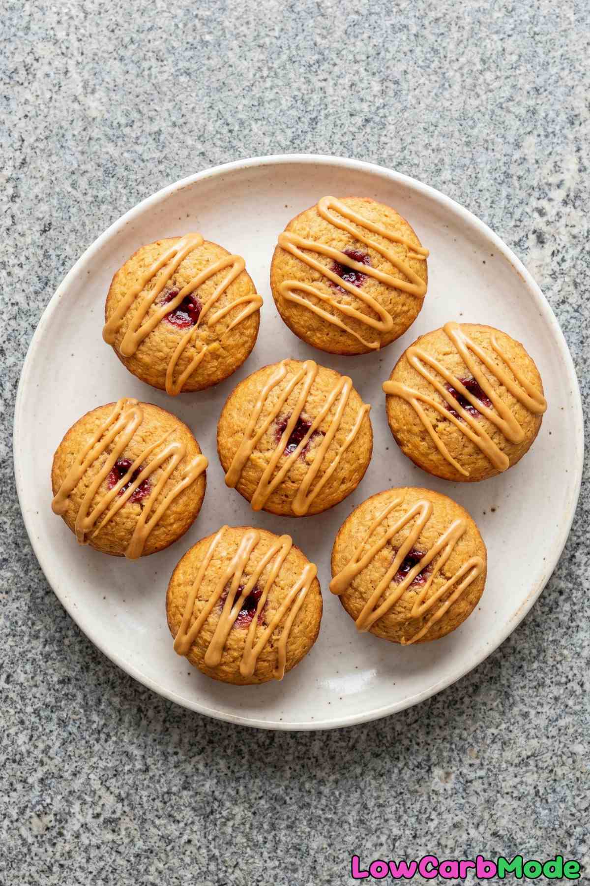 Stuffed keto PB&J muffins on a plate