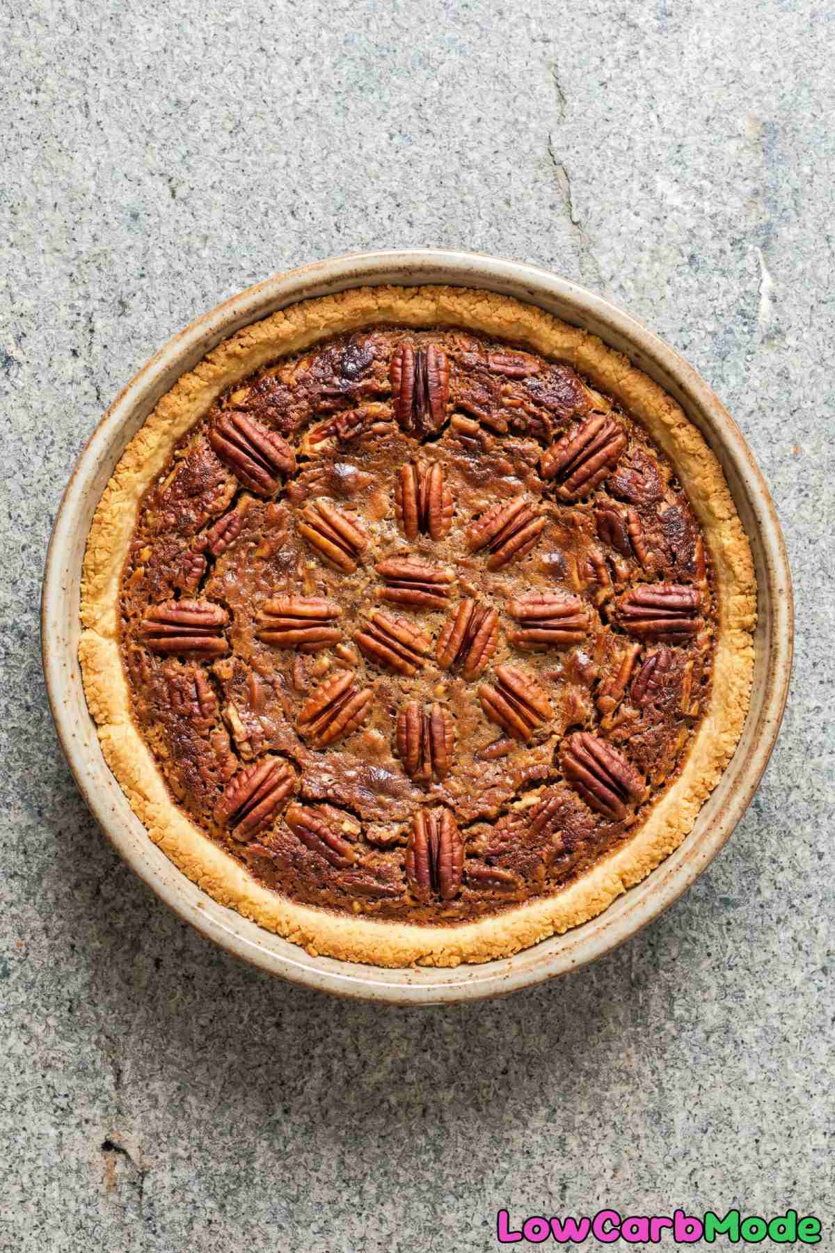 Classic keto pecan pie on a rustic table