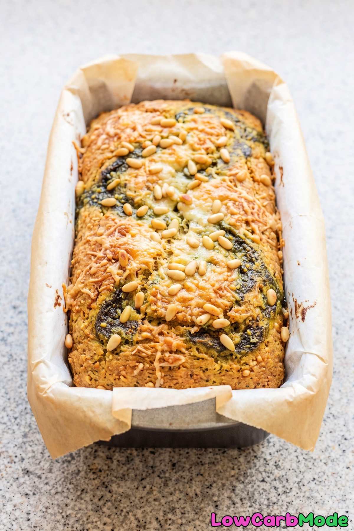 Fresh baked keto pesto swirl bread loaf
