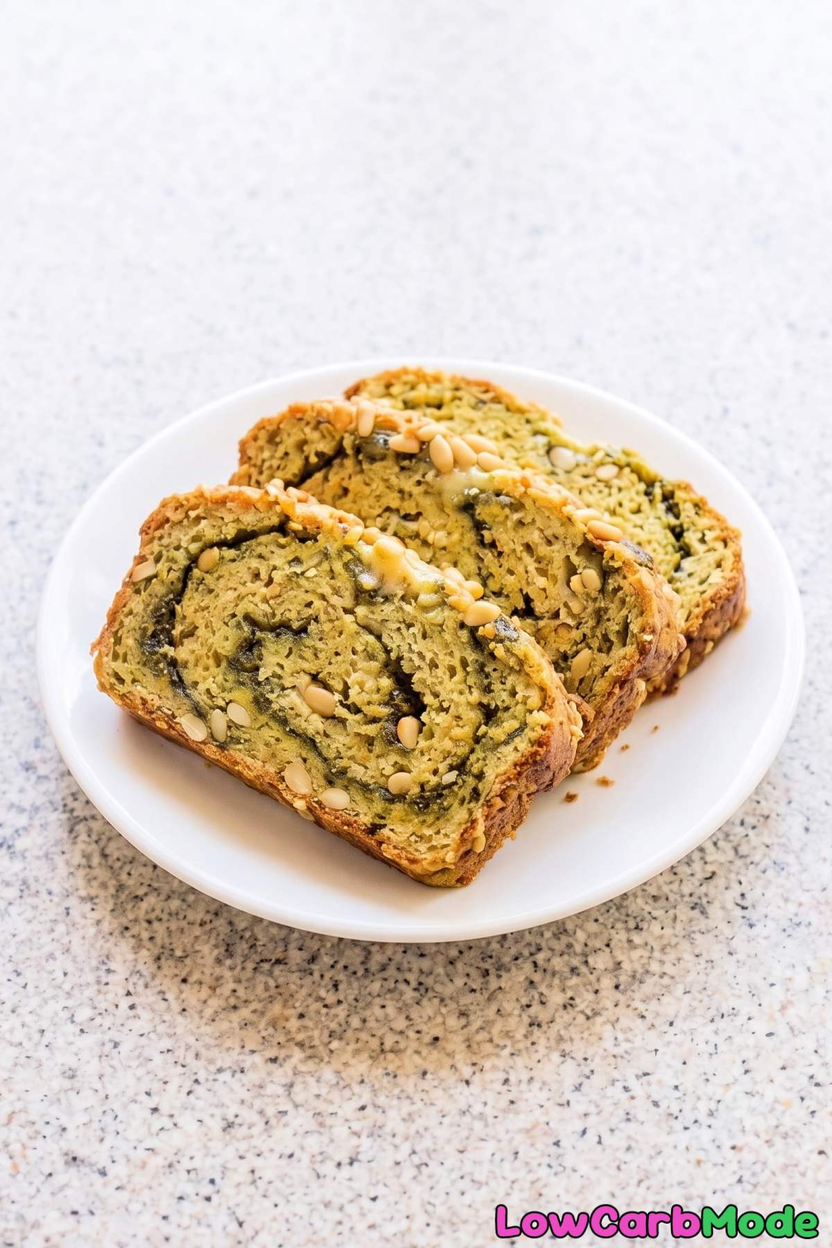 Rustic keto pesto bread with herb swirls