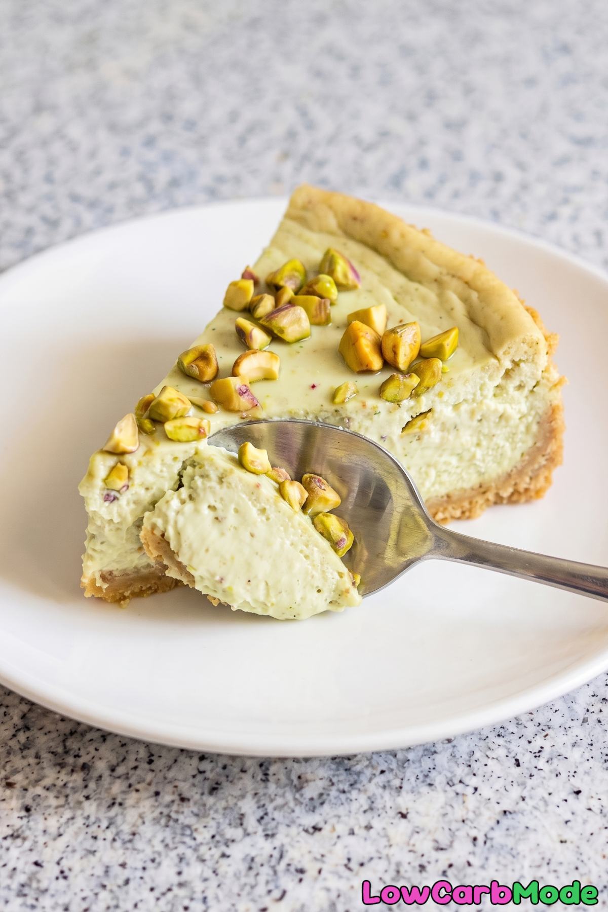 Creamy keto pistachio rose cheesecake