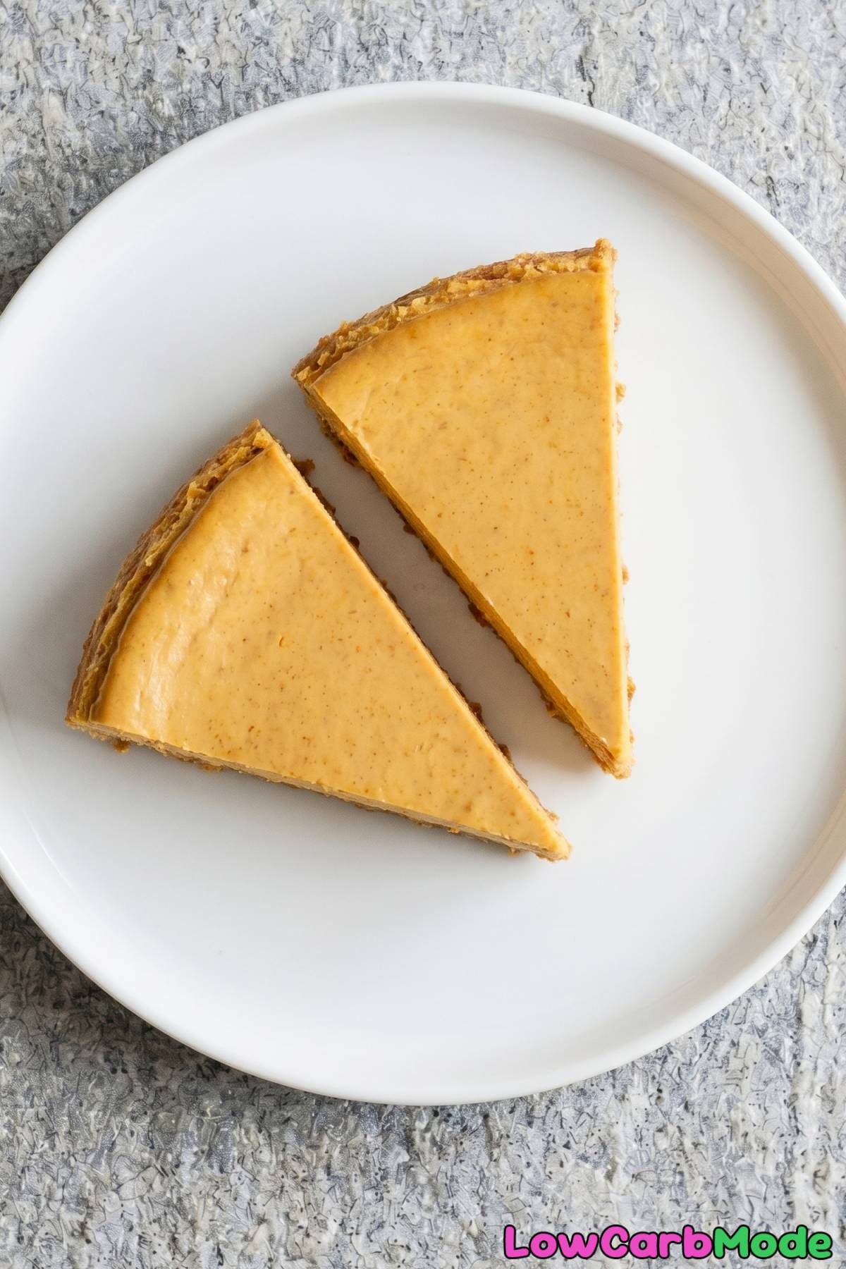 Smooth keto pumpkin cheesecake with crust