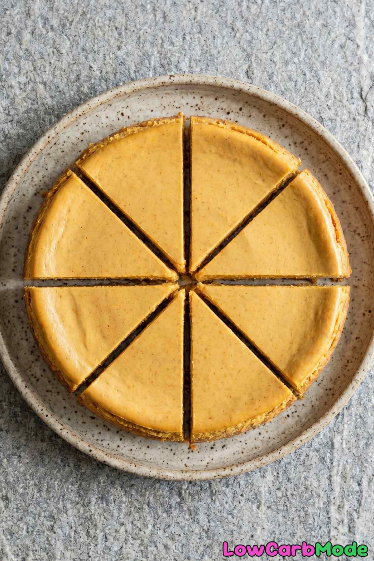 Velvety keto pumpkin cheesecake with topping