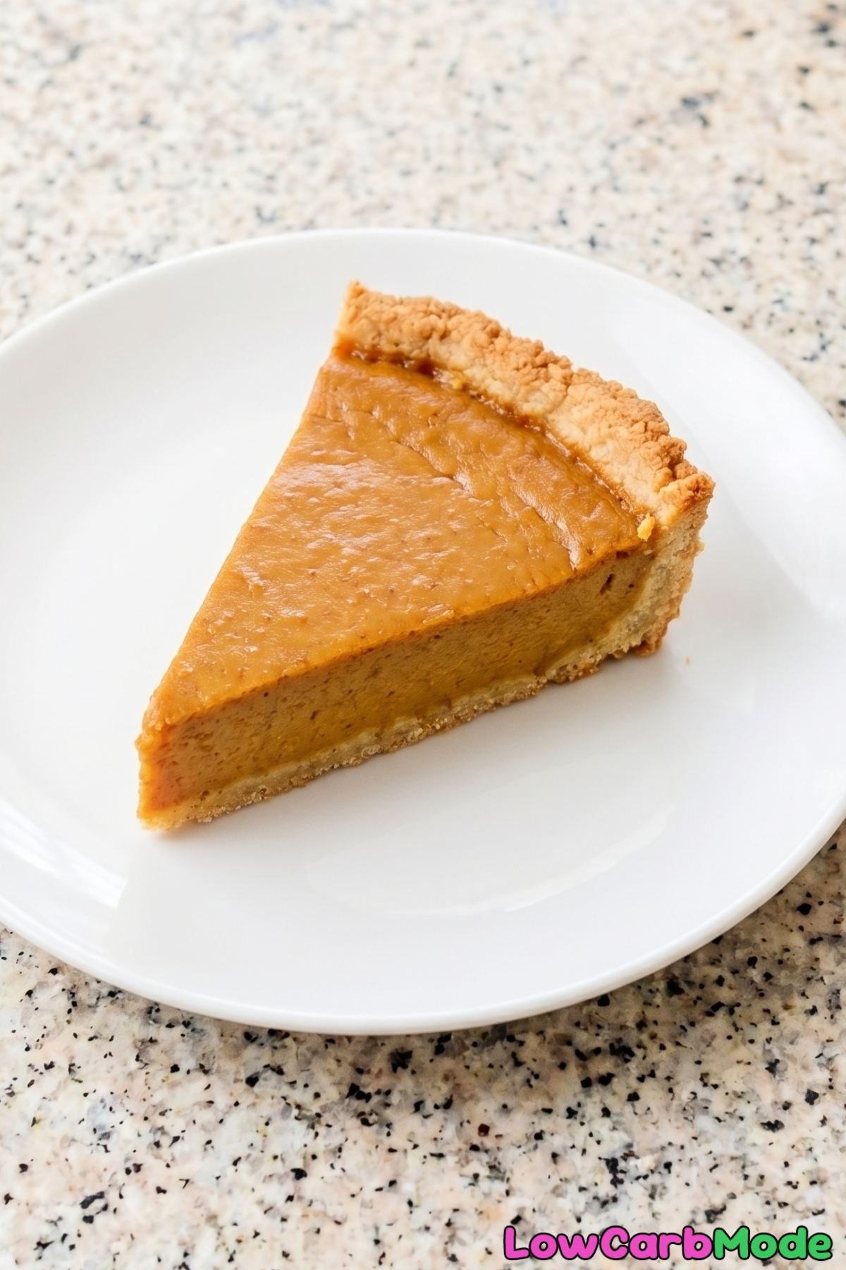 Silky smooth keto pumpkin pie slice