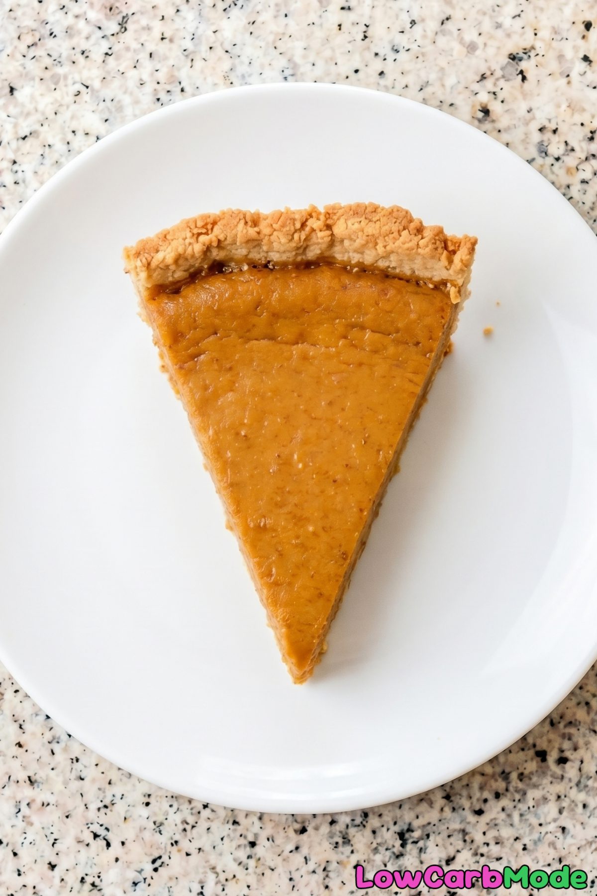 Decadent keto pumpkin pie wedge served