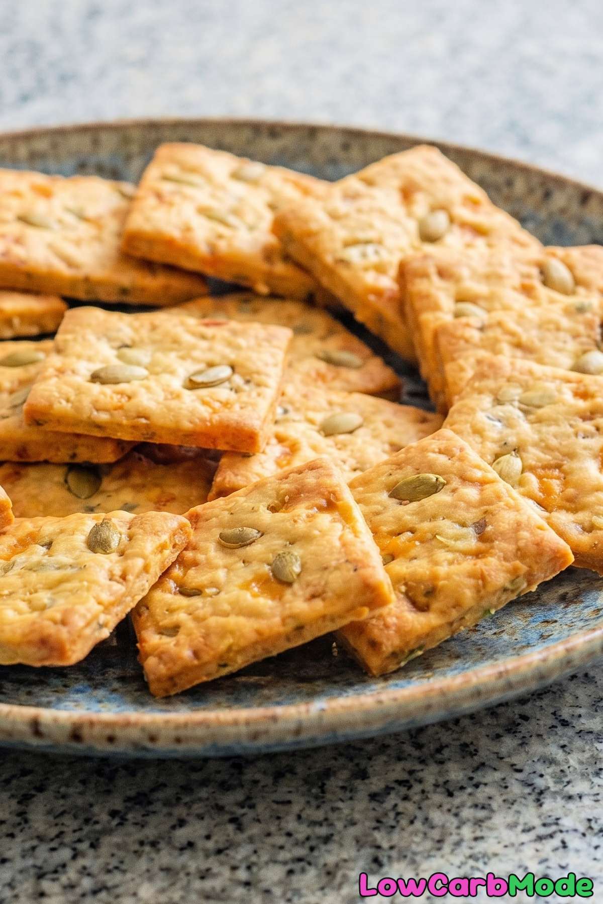 Crunchy keto pumpkin seed & cheddar crackers