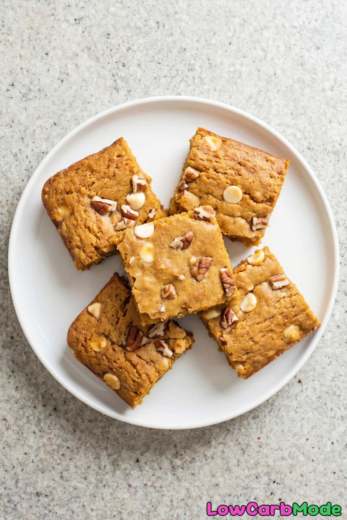 Cozy keto pumpkin blondies on parchment