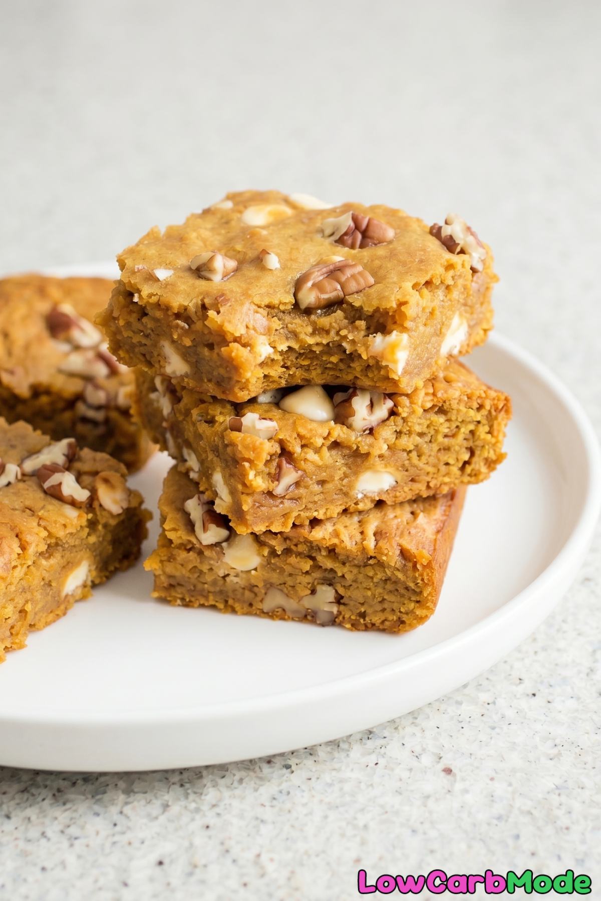 Easy keto pumpkin blondies stacked up