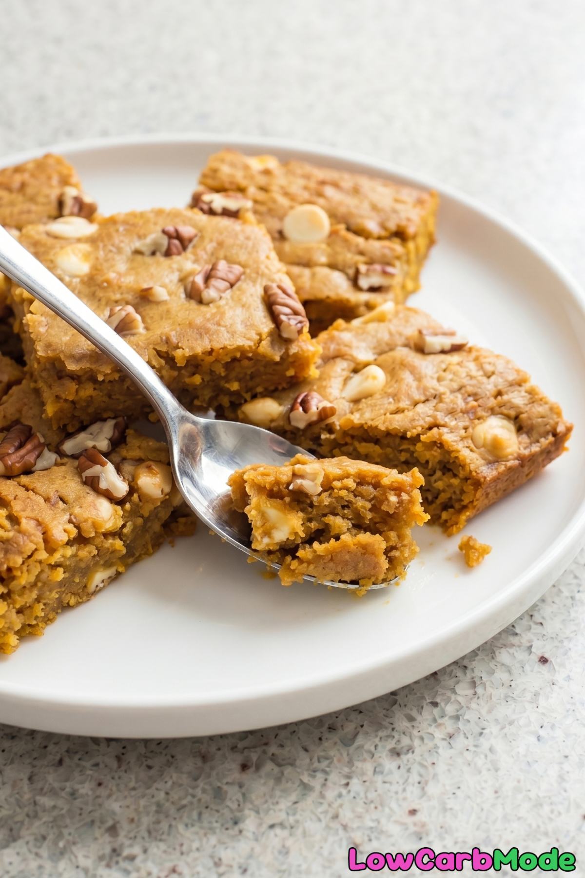Soft keto pumpkin spice blondies on a plate