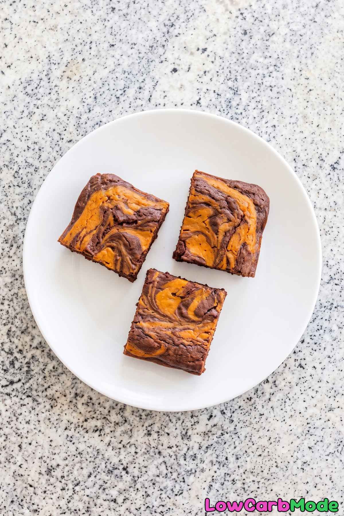 Sliced keto pumpkin swirl brownies