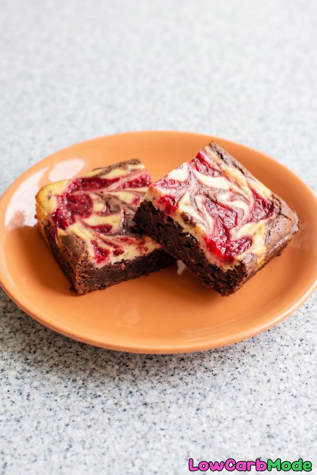 Decadent keto raspberry swirl cheesecake brownies